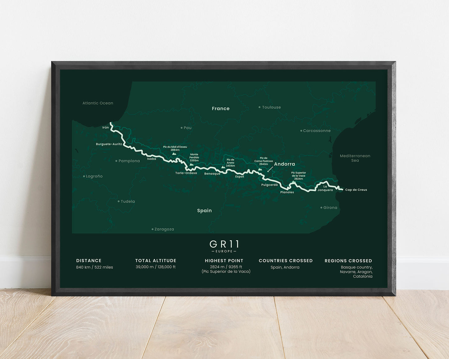 GR11 trail wall art with green background (Cabo di Higuer to Cap de Creus)