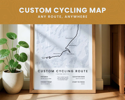 Custom bikepacking cycling map poster on a wall with a plant beside it